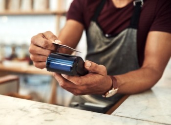 Cashier using contactless payment