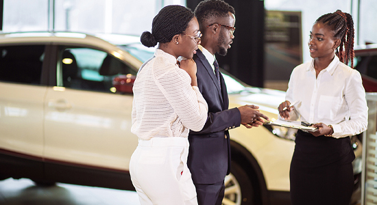 Couple buying a new car