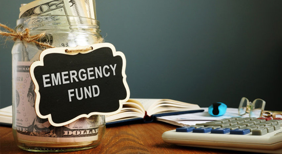 Emergency fund jar with money in it