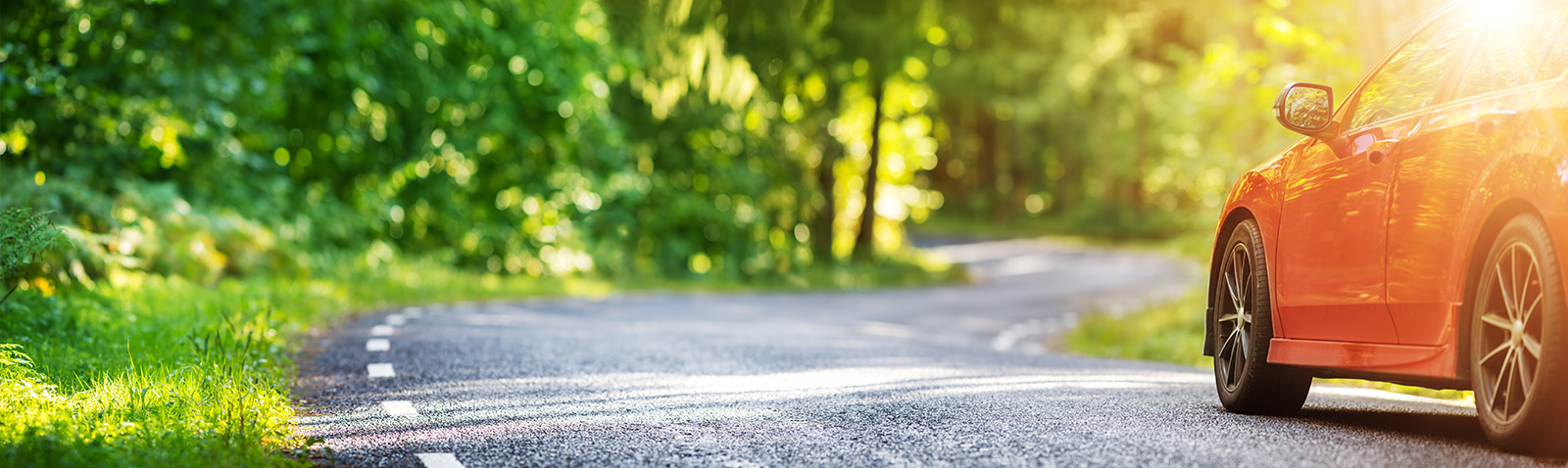Car on a sunny road