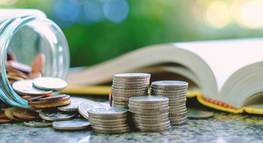 Coins and a book