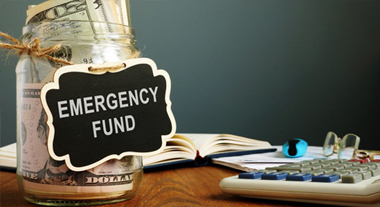 Emergency fund jar with money in it