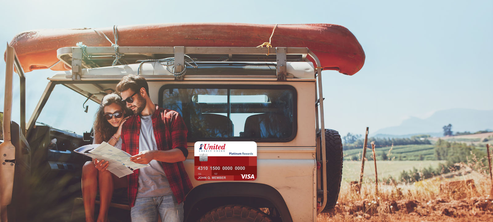 Couple on a road trip in a jeep