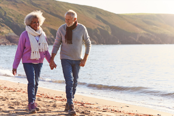 Couple walking on a beach