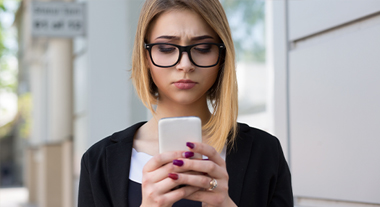 Teen using cell phone