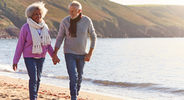 Couple walking on the beach