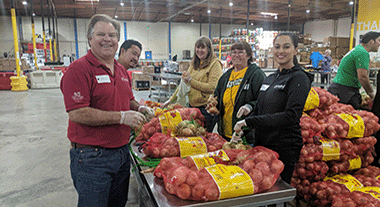 1st United volunteering at food bank