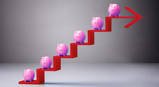 Piggy banks on a ladder