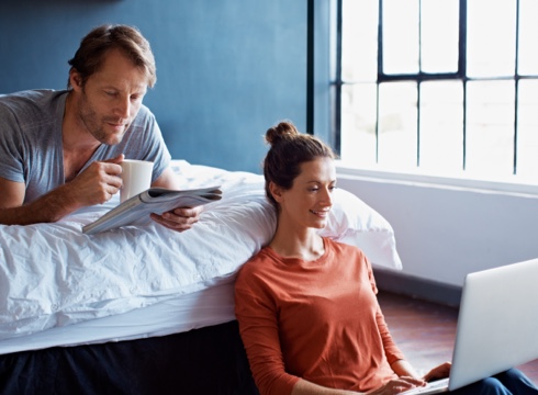 Couple lounging at home