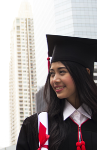 woman with graduation cap and gown