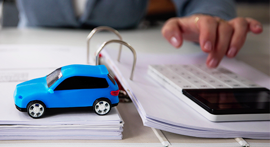 Filing taxes with blue car display