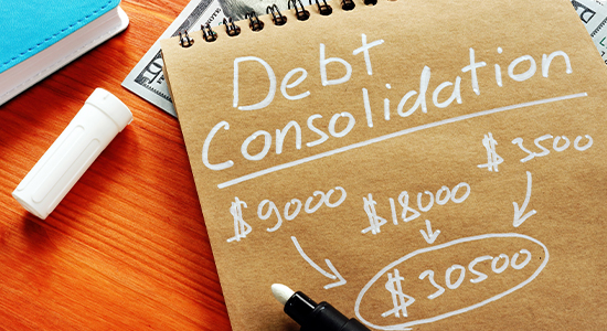 Notebook showing debt consolidation calculations