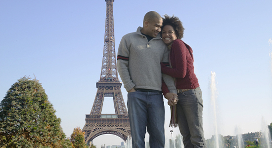 Standing in front of Eiffel Tower