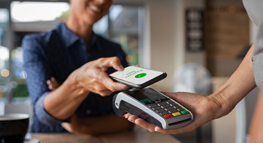Holding phone over a payment terminal
