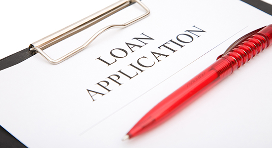 Loan application and a pen