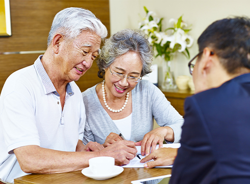 Couple consulting with a bank employee