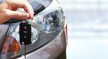 Holding the keys to a new car