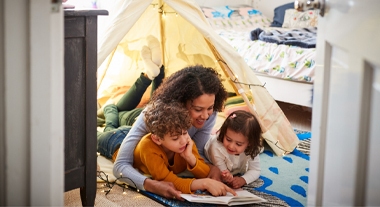 Family camping in the house