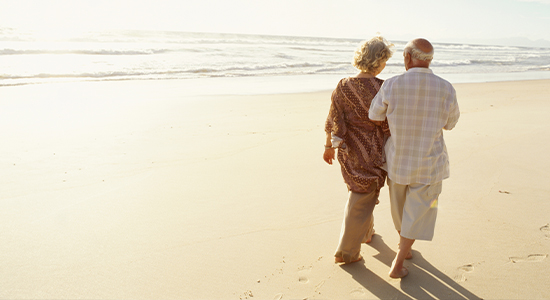 Couple walking on beach