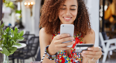 Woman making a purchase on her smartphone